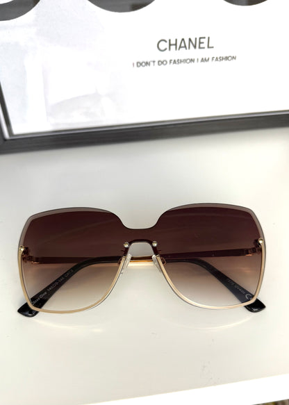 Sonnenbrille mit Farbverlauf gold